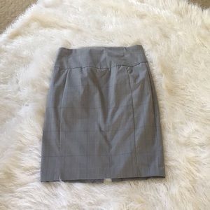 Express banded, high waisted pencil shirt.